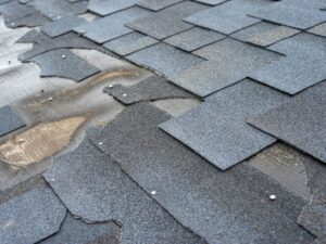damage shingle roofing after storm in Prescott, Arizona