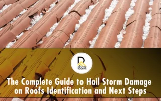 Hailstorm damage to roof: cracked clay tiles covered with hailstones after severe weather